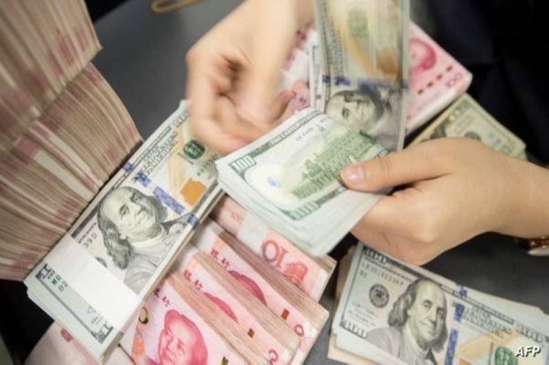 هل تنجح الصين في تحدي الهيمنة العالمية للدولار؟.. محللون يجيبون